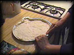 Pressing out the crust